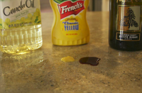 Think about what happens to a kitchen counter every day. People splash acids on it. They spill things that stain it. They chop and slice on it. They set hot pots and dishes down on it. And they clean and clean and clean it with water and chemicals and green scrub-pads